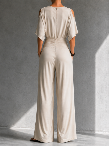 Ondina | Tuta beige con scollo a portafoglio e gamba larga