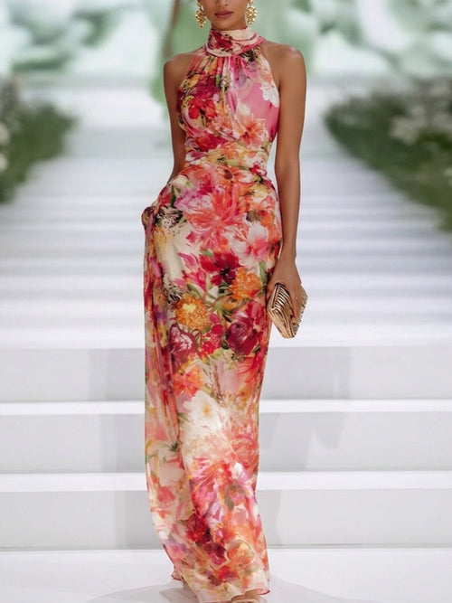 Letizia | Maxi abito floreale con scollo halter e vita segnata