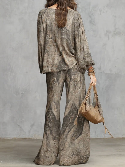 Ornella | Completo grigio a fantasia paisley con maniche a lanterna
